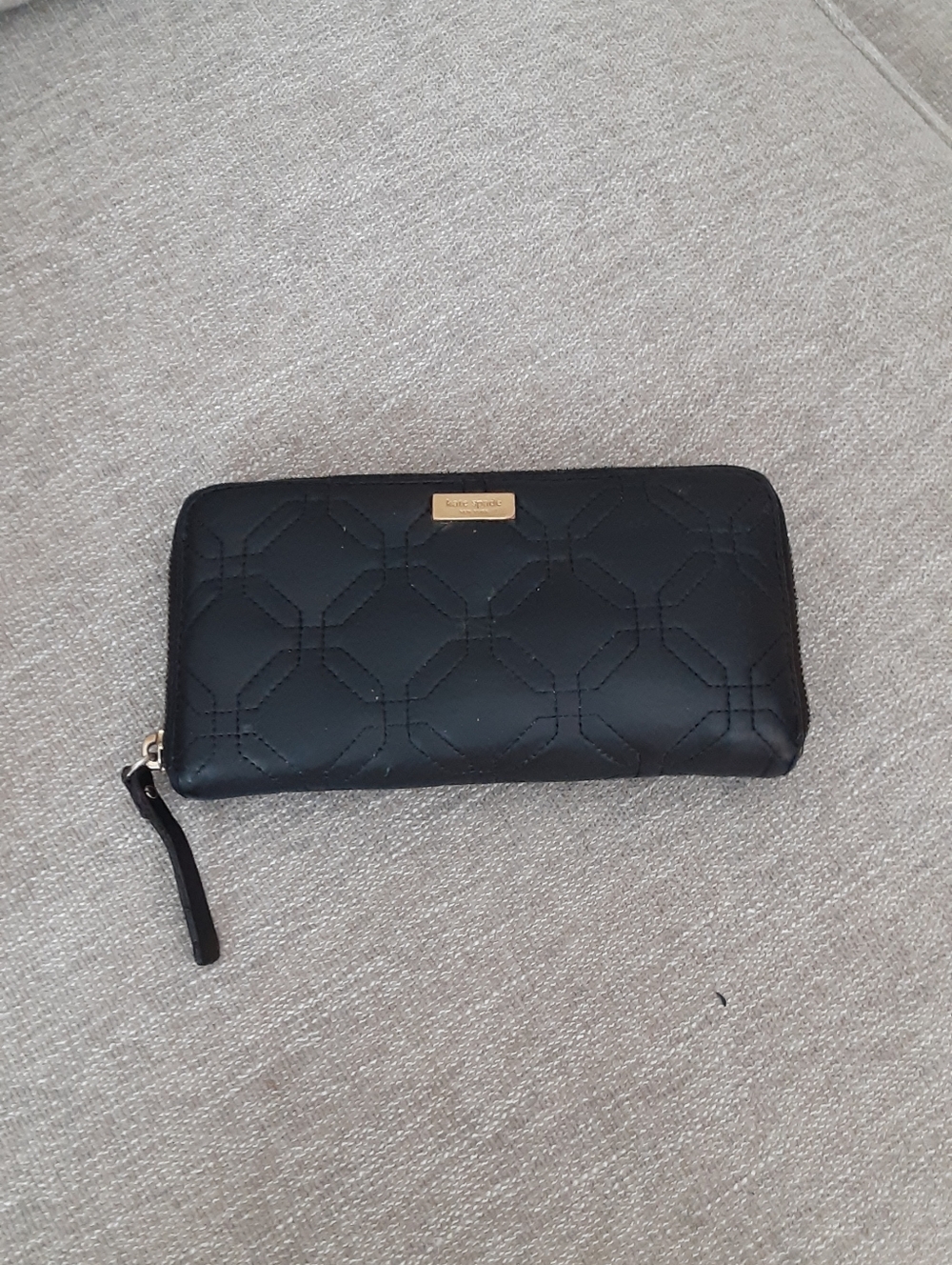 kate spade Black Quilted Zip-Around Wallet with Gold Plaque